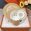 10", 8" plate with cups and saucers four-piece set with gold braid pattern