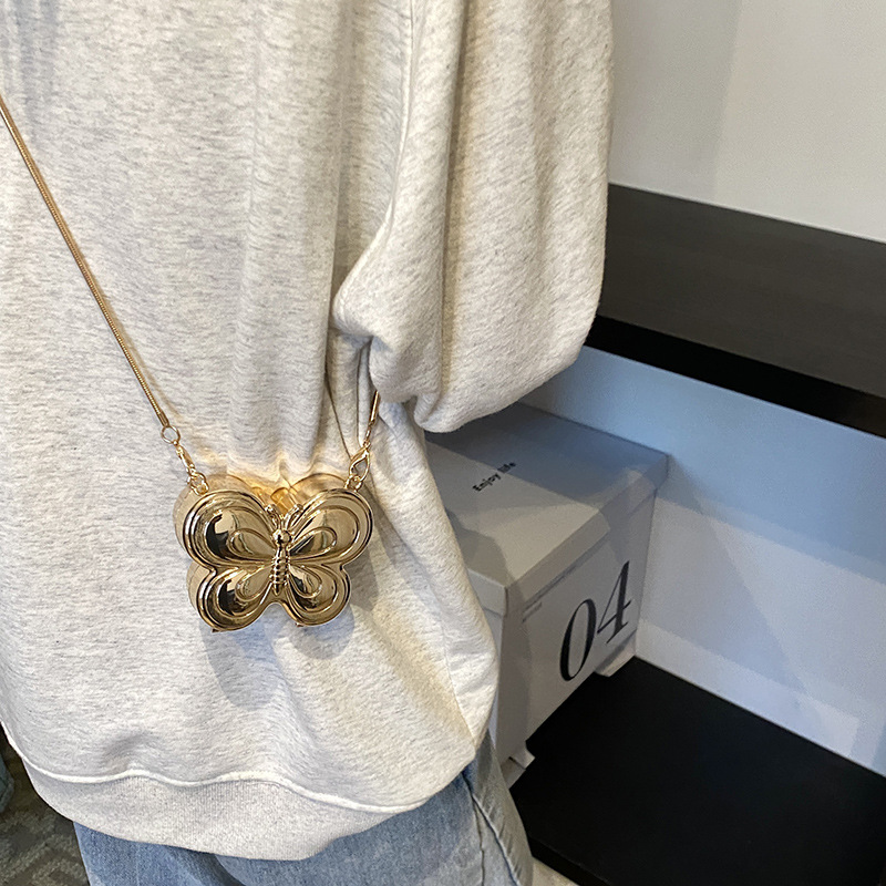 Bolso de cena de lápiz labial dorado mariposa transfronterizo bolso de moda europeo y americano flor de alta gama metal pequeño bolso femenino de moda