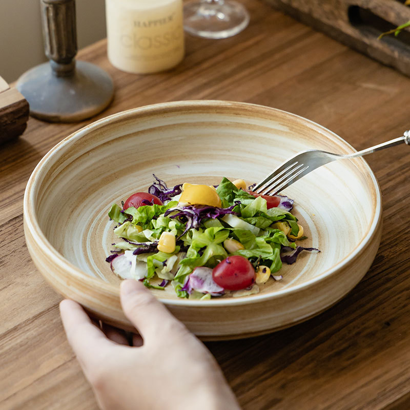 Hacer platos de platos de cerámica de tornillo de color creativo al por mayor platos de ensalada de restaurante platos domésticos platos redondos