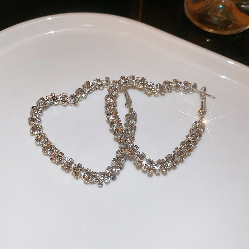 Pendientes de anillo de oreja en forma de C de circón verde con aguja de plata Pendientes exagerados de moda europea y americana para mujer Pendientes de sentido de alta calidad con incrustaciones de diamantes al por mayor