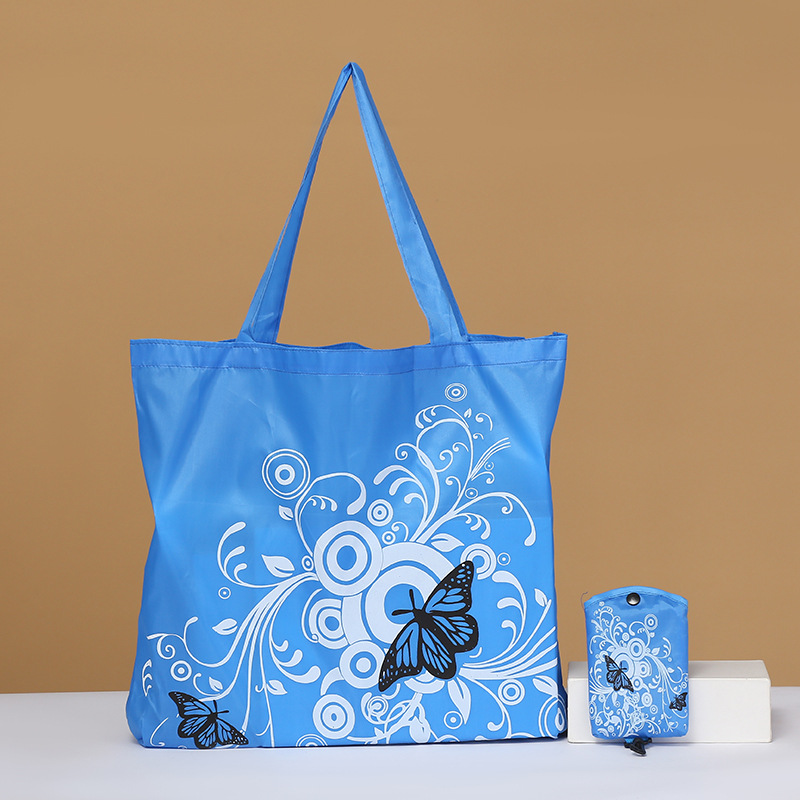 Bolsa de compras plegable de flores de mariposa Portátil Bolsa de protección ambiental en stock logotipo imprimible bolsa de almacenamiento de tela de poliéster Oxford