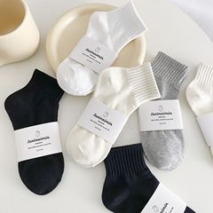 Cream socks women's cotton ins trendy summer thin solid color Japanese black socks sports four seasons white socks