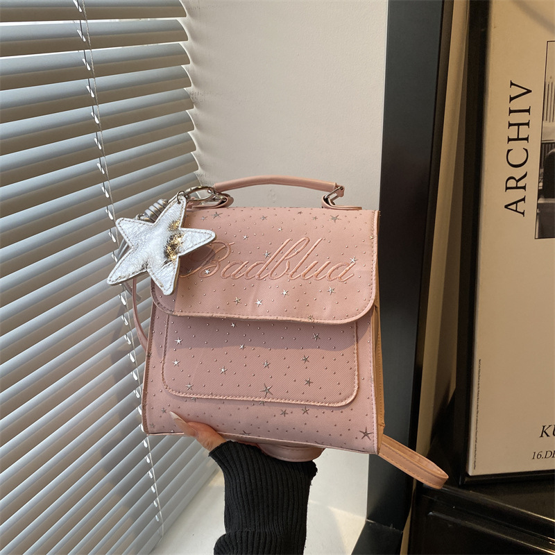Mochila de moda coreana 2026 nuevo estilo coreano estilo académico letras versátiles bolso de hombro de mano