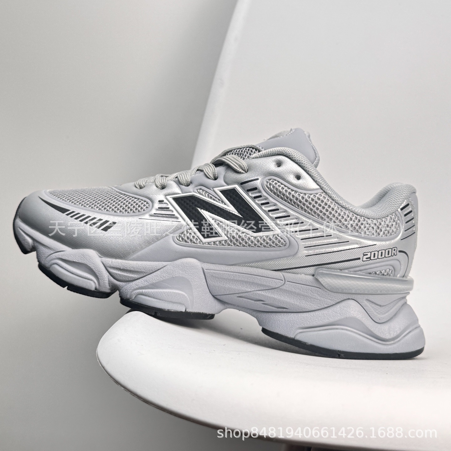 Putian NB M2000 serie de moda versátil tela de cuero artificial de cerdo amortiguador antideslizante desgaste zapatillas de correr bajas