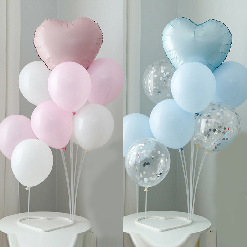 Blue and pink love-shaped table floating balloons tabletop simple…
