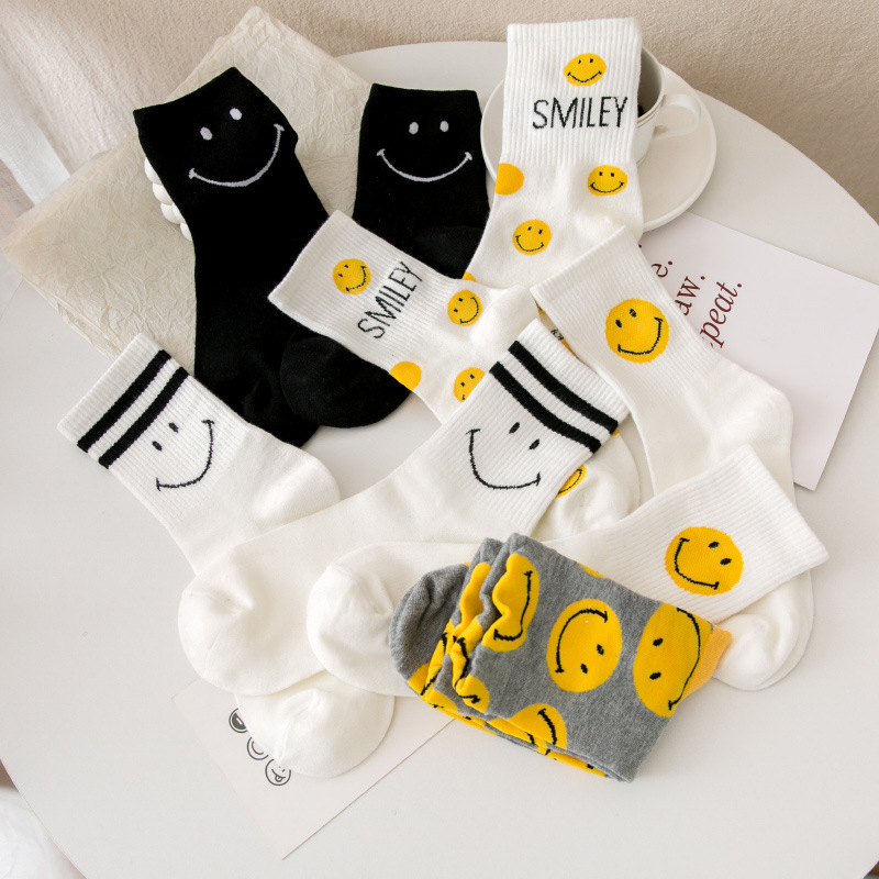 Calcetines de cara sonriente calcetines de algodón de primavera y otoño para mujer calcetines de media pantorrilla estilo preppy a rayas de moda largos calcetines de algodón deportivos de otoño medias