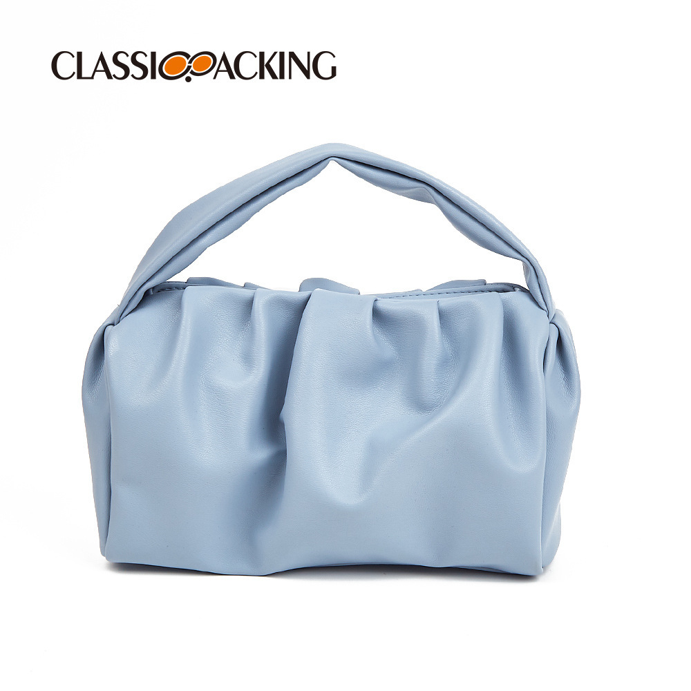 Bolso de nube simple japonés, textura ins, bolso de mujer de color sólido, moda, bolso de mano de celebridad de Internet, bolso de cosméticos