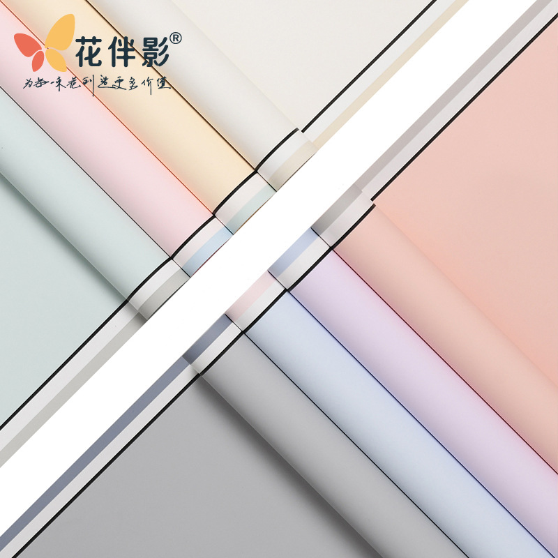 Oferta especial Papel Luoshang Papel de marco fotográfico con memoria Película de caramelo Serie de esmalte de punto de onda Papel de embalaje de flores Papel impermeable no tejido