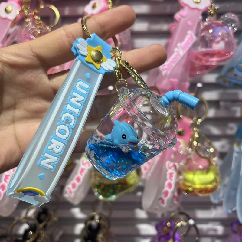 流砂ボトルキーホルダイルカ漫画オイルミルクティーカップ絶妙なかわいいペンダントクリスタルカップ漂流ボトルキーホルダー|undefined