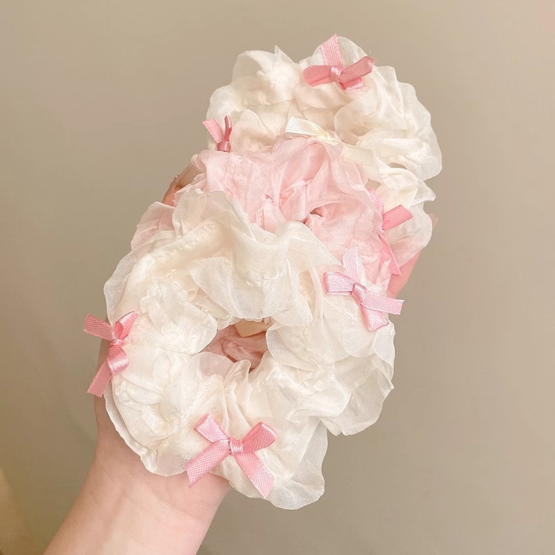 Hermoso anillo de cabello de malla arco intestino grueso para mujeres 2025 nuevo cabello de cabello cuerda de ballet de viento de bola cabeza banda de goma