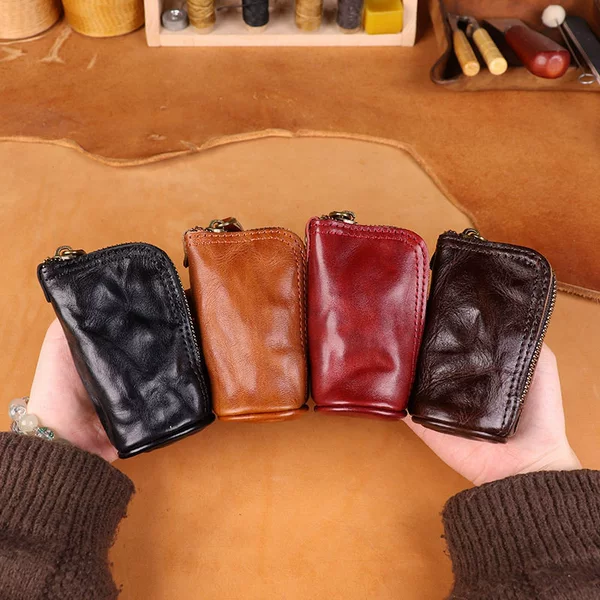 Top-layer cowhide cross-border wholesale coin purse, small bucket bag, hangable, vintage fashion, foreign trade, simple and high-end, unisex key pouch