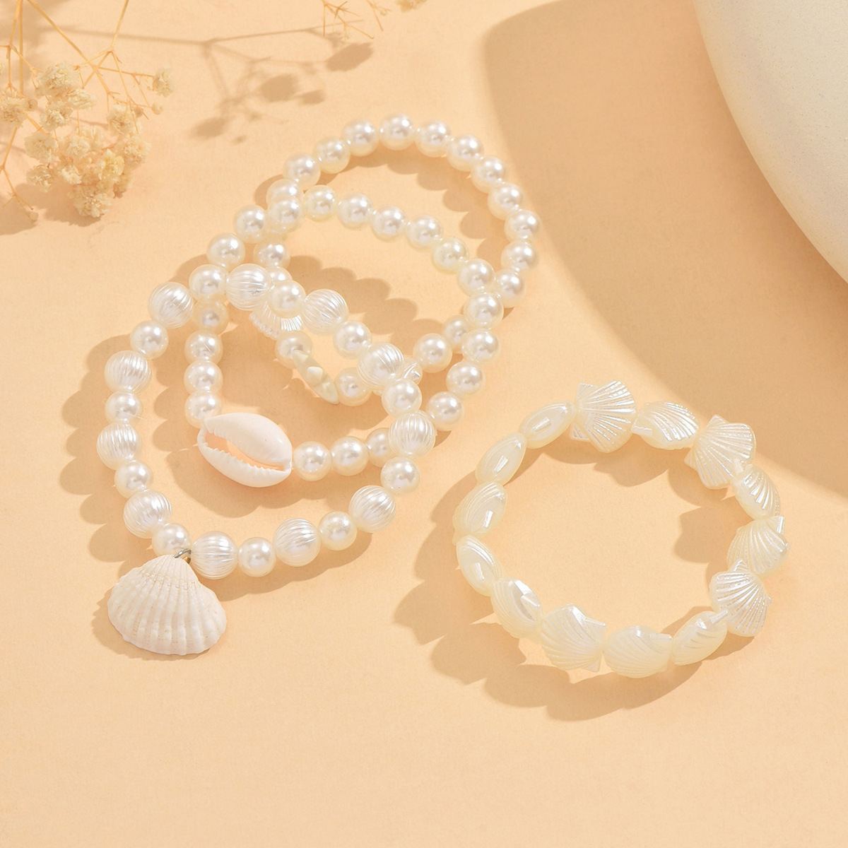 Bracciale elegante da donna con perle e conchiglie naturali_voghion.com