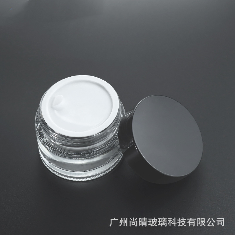 Suministro de fábrica 5g10g-50g en stock al por mayor botella de vidrio transparente cosmética sub-botella de crema facial botella de crema