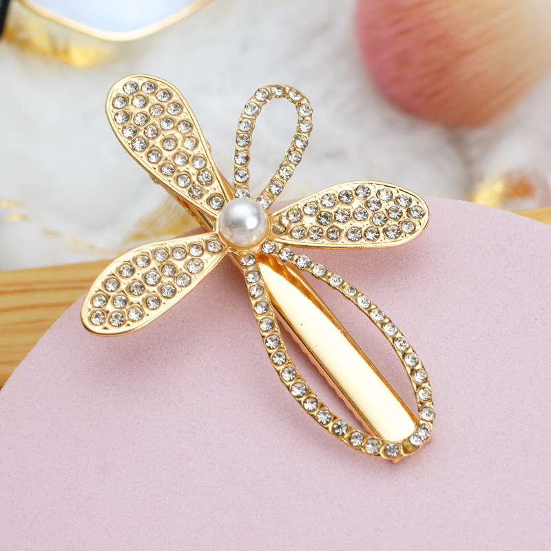 Fashion Star Bow Knot Metal Inlay Rhinestones Pearl Hair Clip 1 Piece display picture 3