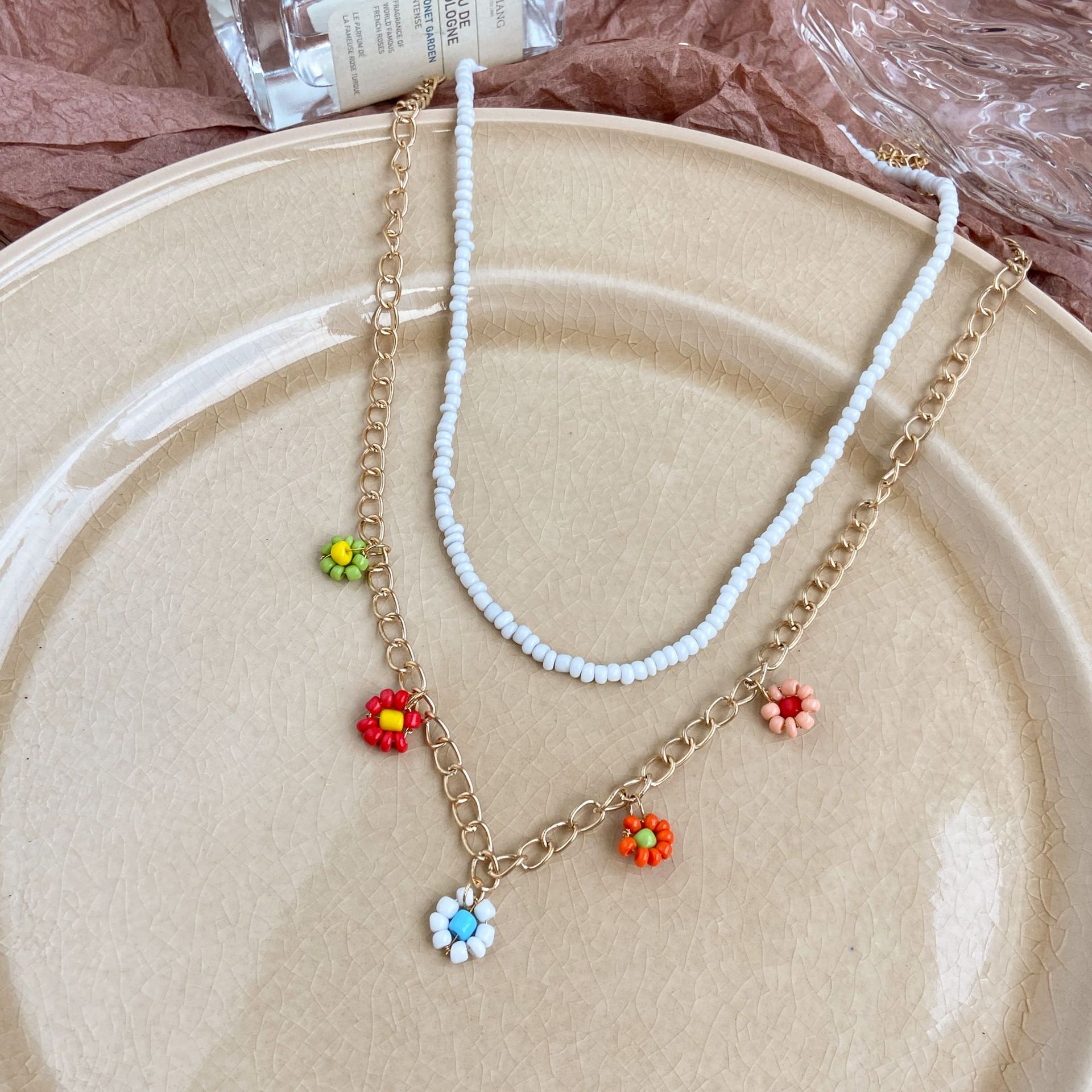 Vente En Gros Bijoux Pendentif Marguerite Couleur Collier Multicouche Perlé Nihaojewelry display picture 7