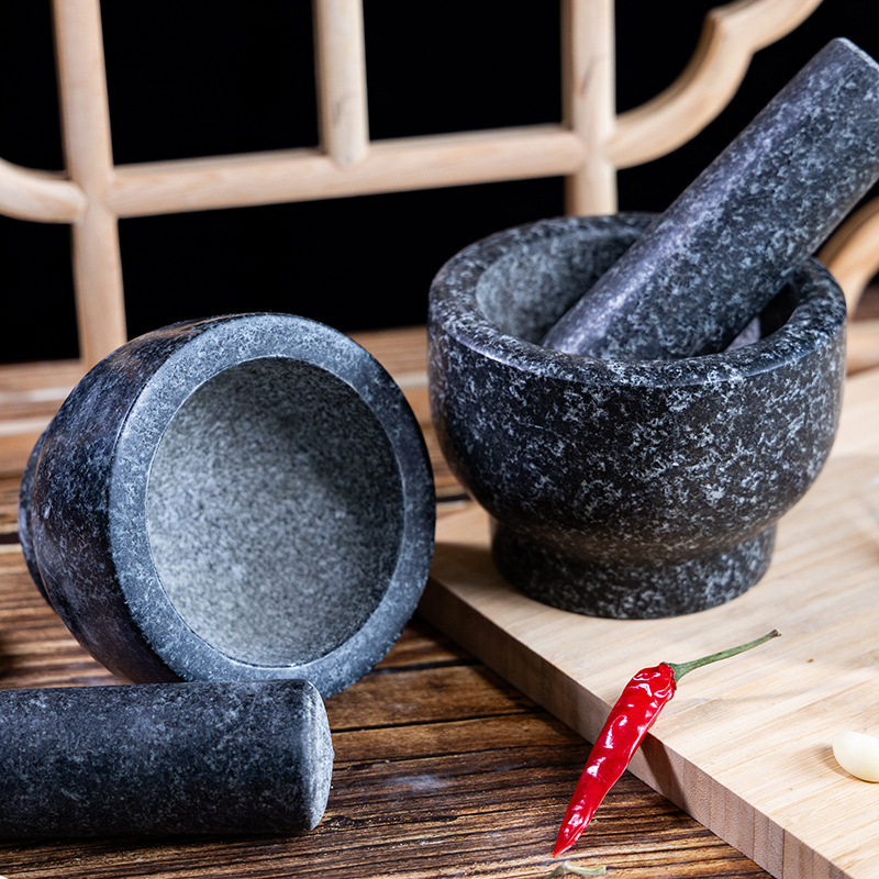 un cilindro de piedra negra tipo molino de piedra de grasa