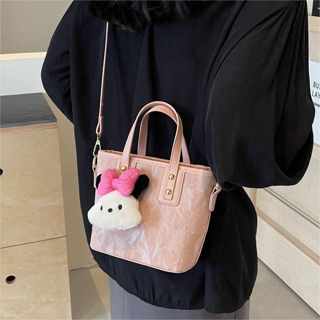 Bolsa de cubo de mano de moda coreana para mujeres primavera y verano 2024 nuevo nicho casual de moda universal mochila de hombro