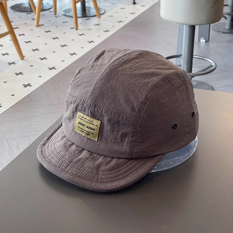 Estilo japonés de secado rápido transpirable gorra de béisbol de ala corta para hombres y mujeres ropa de trabajo versátil suave superior hip hop gorra de pico Sombrero de marea de ala suave para mujer