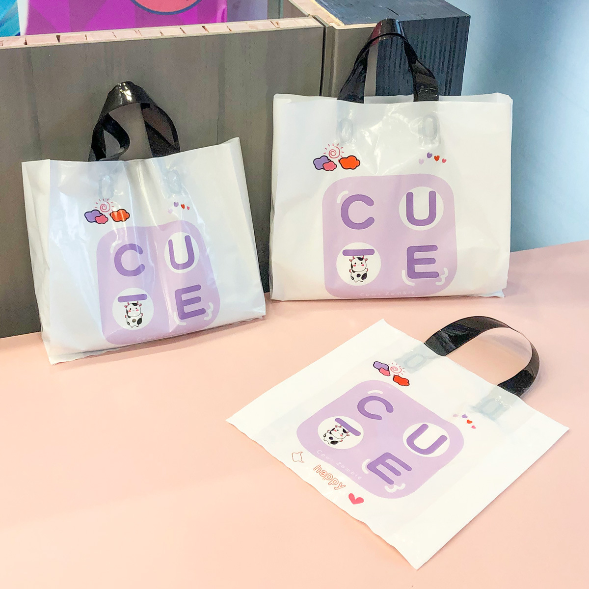 新款服裝店手提袋塑料袋禮品袋購物包裝袋印刷logo袋子服裝店用