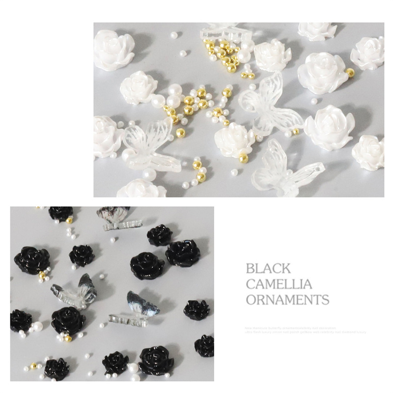 Internet celebridad nueva manicura blanco y negro Camellia perla joyería tridimensional mariposa oro bola de acero mezclado joyería de uñas