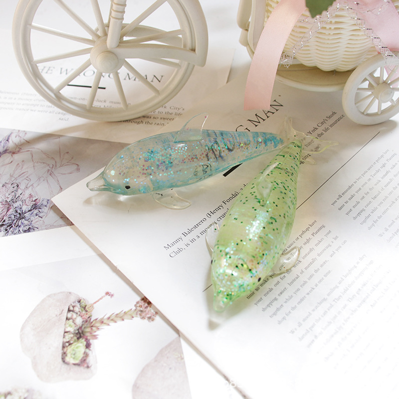 Ventas transfronterizas calientes de malta de delfines pellizco de compresión juguetes de alivio de la emoción artefactos mágicos regalos para niños al por mayor