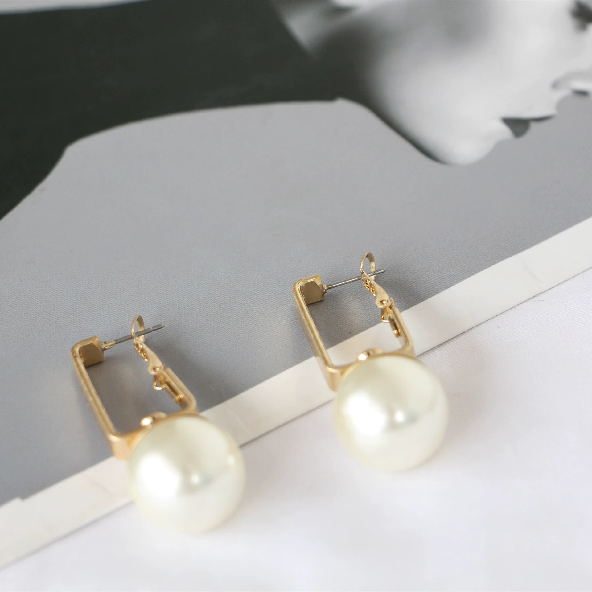 Design earrings from pearl, accessory, trend of season, wholesale
