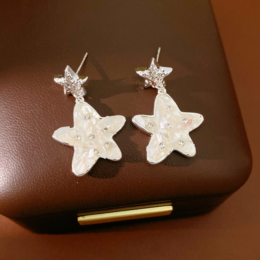 Agujas de plata con diamantes de marilla pernos de estrellas personalidad exquisita moda aretes de lujo ligero aretes de alta calidad al por mayor mujeres image 7