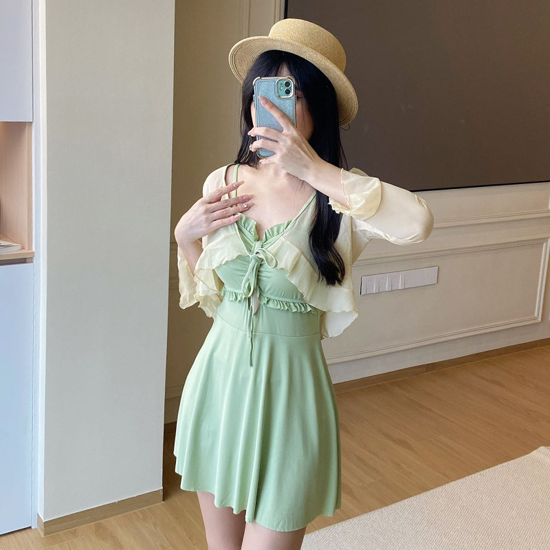 2025 nuevo traje de baño para mujer, una pieza, falda delgada y conservadora, sentido de alta gama, traje de baño de vacaciones de aguas termales junto al mar, mujer al por mayor