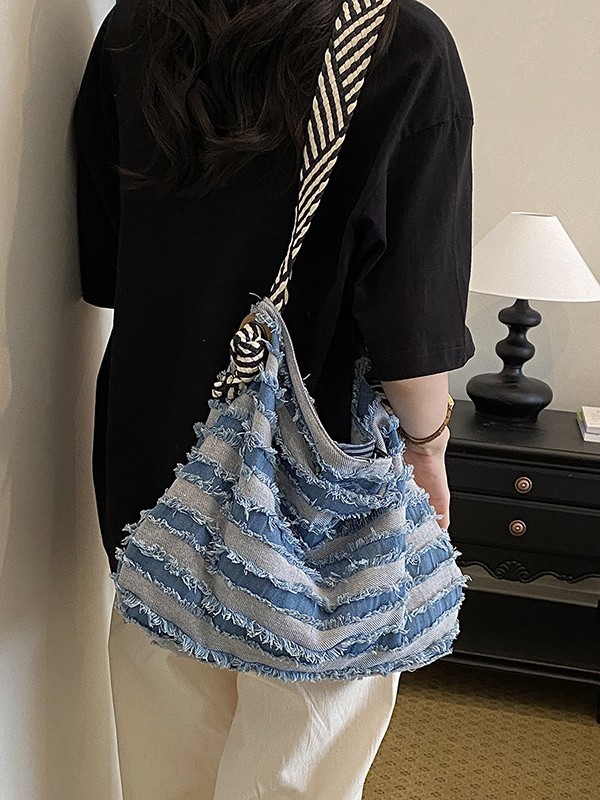Bolso de denim de gran capacidad para mujeres 2026 verano nuevo estilo retro hacer vieja mochila de hombro de viaje bolsa de ocio