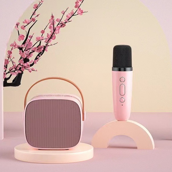 K1 al aire libre portátil mini micrófono inalámbrico con luces de colores karaoke Bluetooth audio traje transfronterizo al por mayor