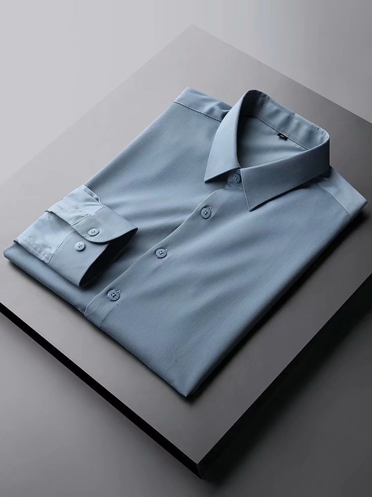 Camisa de manga larga de color sólido estilo coreano de los hombres de Moda Ropa superior casual diseño sentido ins marca de moda camisa suelta y guapo