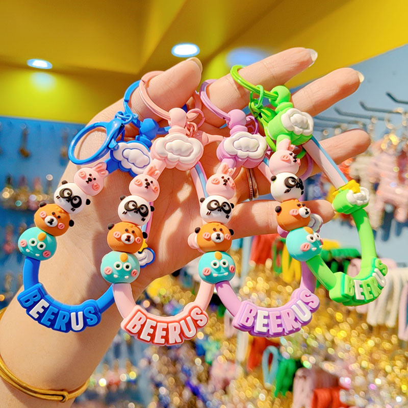 Cartoon adhesivo blando para teléfonos móviles colgantes de llaves de automóviles adornos colgantes de color caramelo pintado accesorios de llaves embalaje