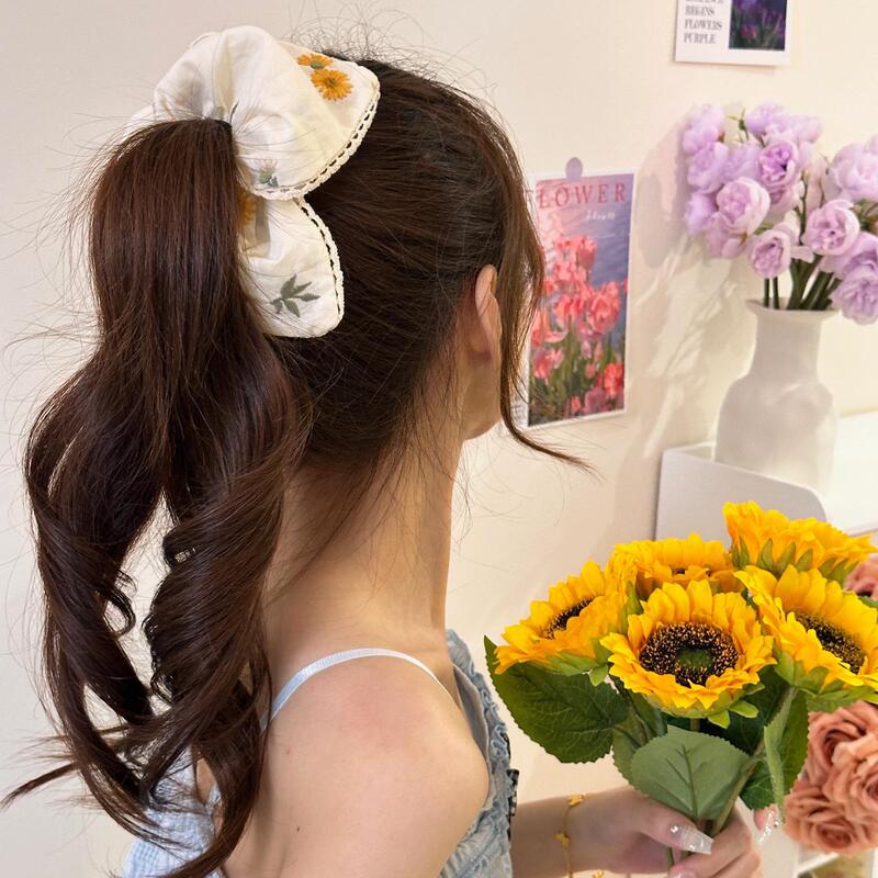 森系クリームの黄色のデイジーの花の大腸の輪の三角巾のフランスの少女の刺繍の不規則な三角巾のレースのヘアバンド|undefined