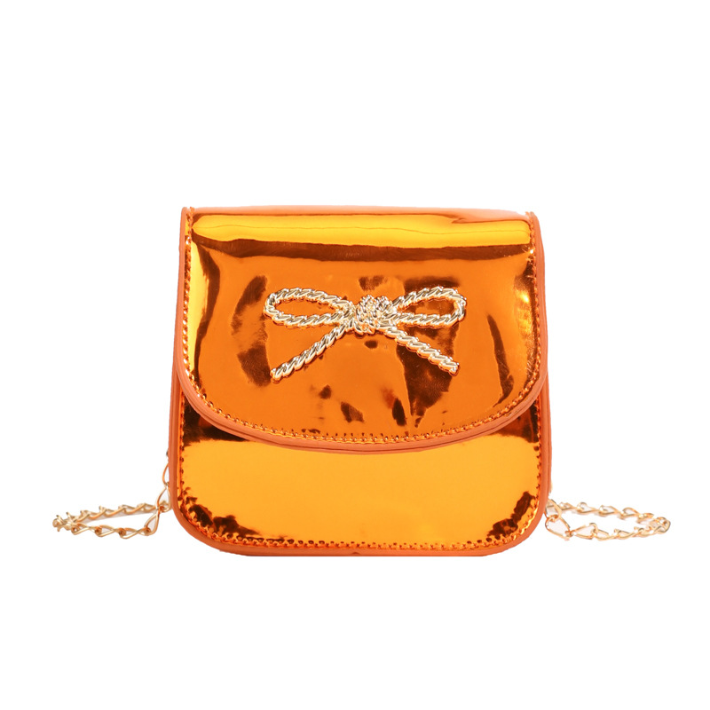 Bolso de hombro para niña coreana Dulce perla bowknot Cadena de moda Bolso de mensajero para bebé Bolso de niño brillante con láser