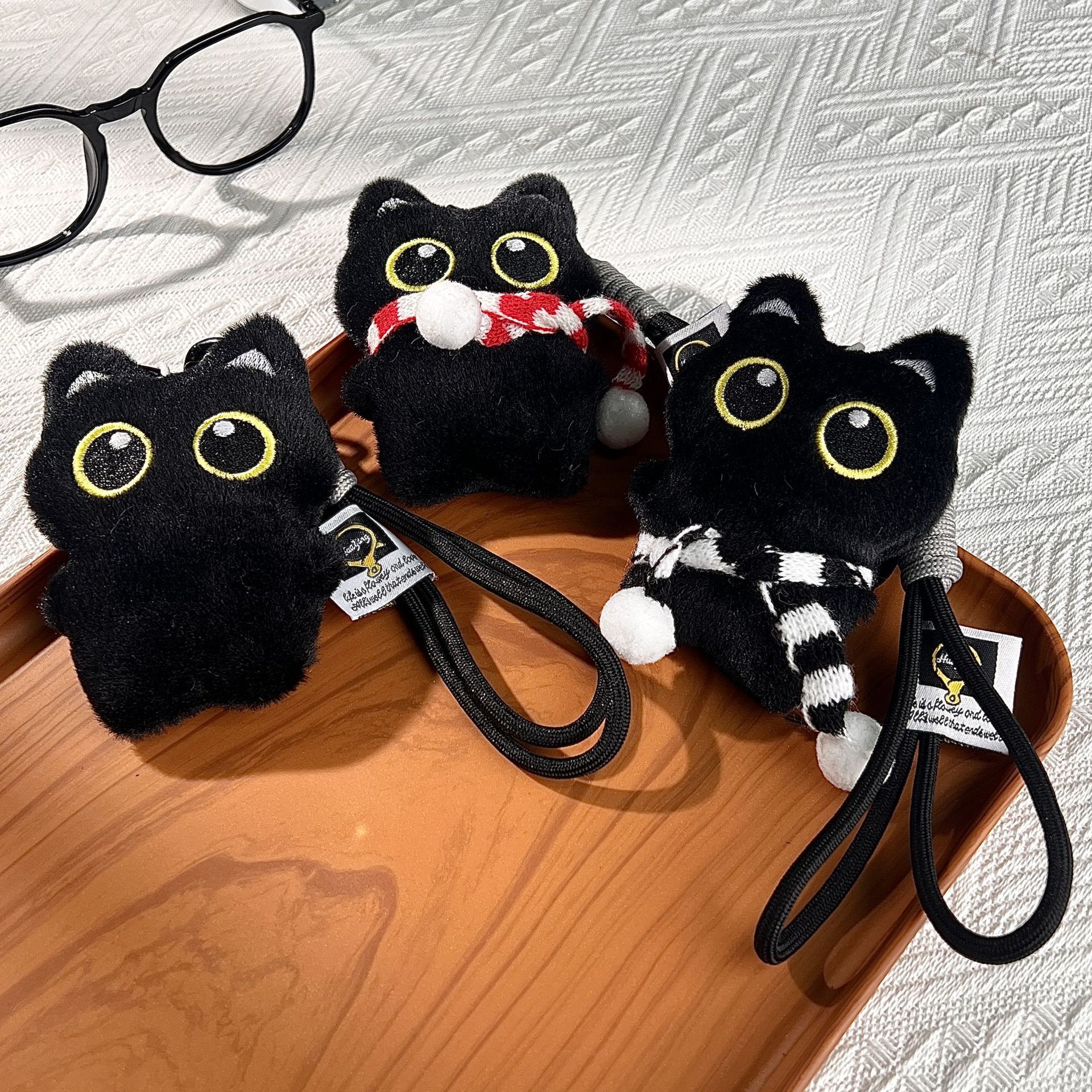 Muñecas chirriantes juguetes para niños accesorios de peluche colgantes llaveros de automóviles muñecas gatos al por mayor