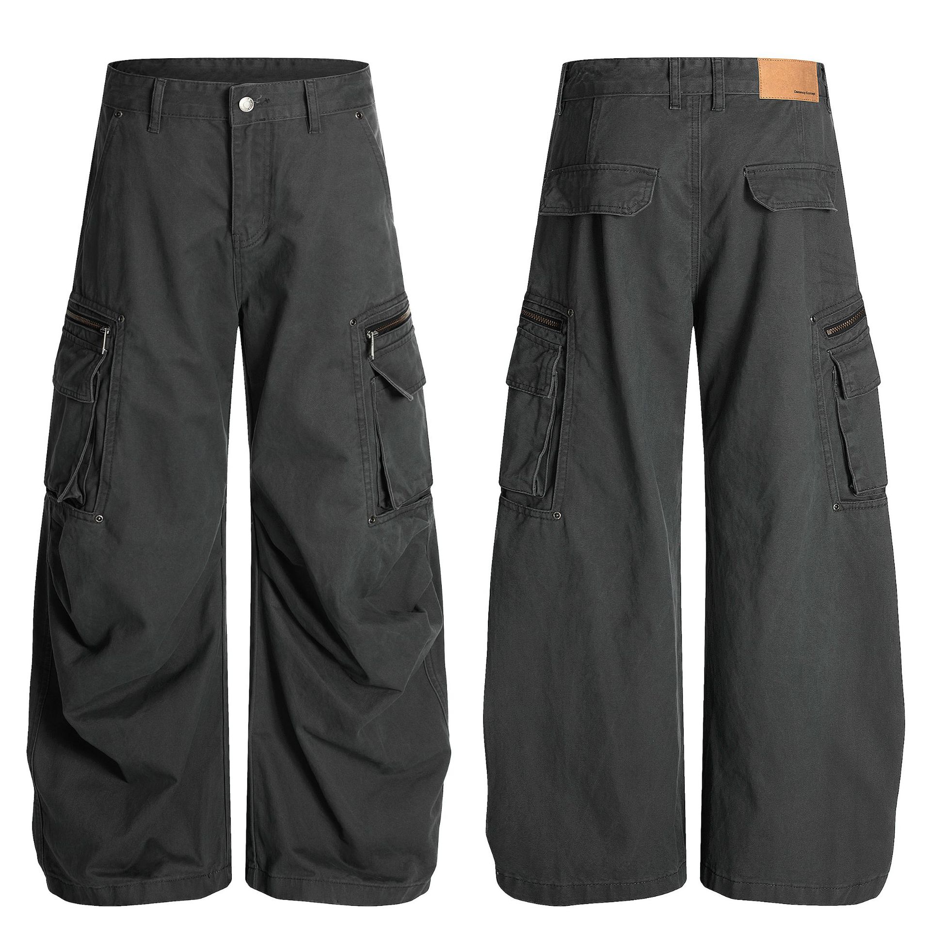 Z 008アメリカのレトロな中性モデルの高級感は重工業の設計のゆったりしている男性式の曲がった刀の型のカジュアルな仕事のズボンを構成します。