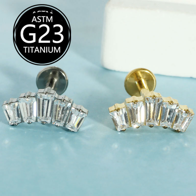 Silver pointed spike labret stud material detail