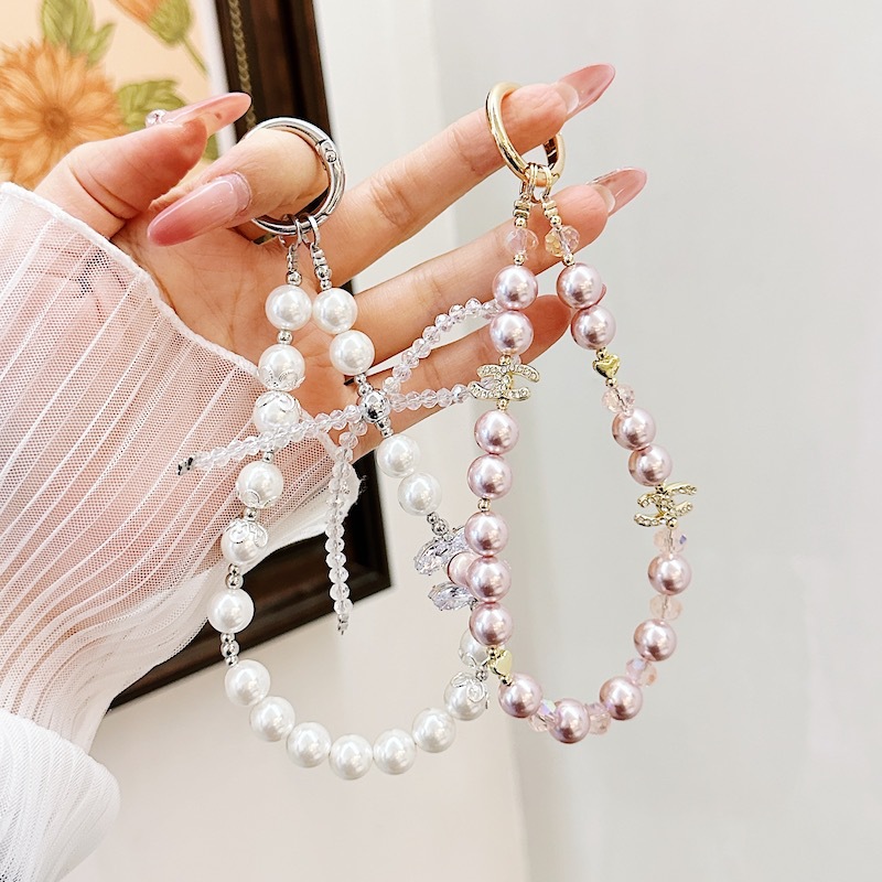 Boutique hecho a mano de alta gama cadena de teléfono móvil cadena de pulsera de perlas de tres colores cordón de teléfono móvil de moda colgante de mensajero largo