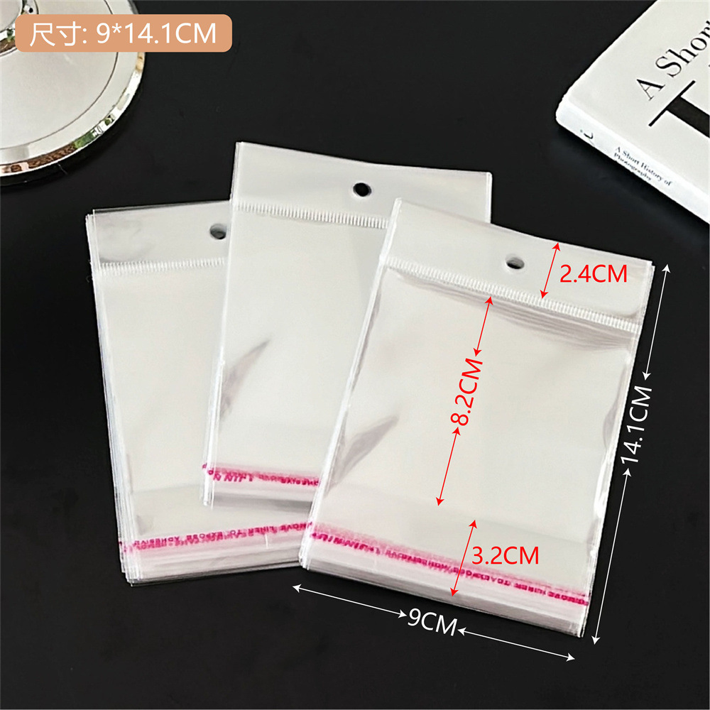Colección de bolsas opp transparentes, cabeza de tarjeta, bolsa de embalaje trasera, bolsa de joyería pequeña, bolsa autoadhesiva con orificio colgante, bolsa de embalaje de plástico al por mayor