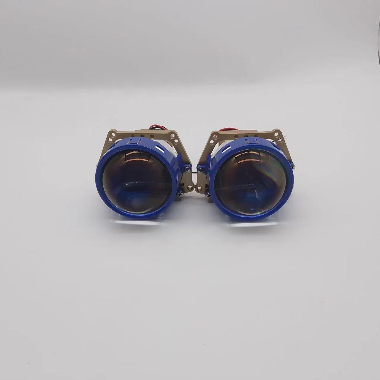 LED de doble luz de la lente faro 55W brillante proyector fuerte lejos y cerca de la modificación integrada de la película Azul faro al por mayor