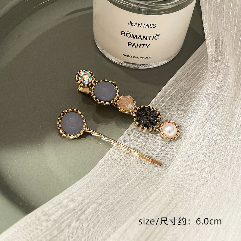 Corea del Sur clip para el cabello de perlas en línea clip para el cabello de mujeres rasgadas clip para el cabello de una palabra clip para el cabello de bordes fría BB clip lateral clip para el temperamento clip para la cabeza