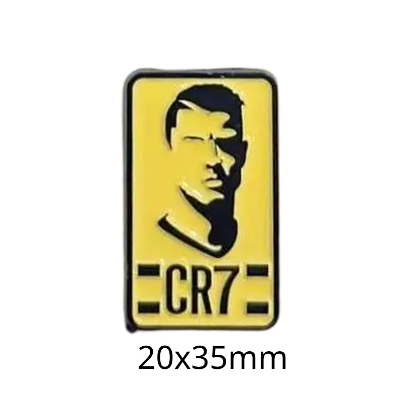 Fabricante personalizado Champions League World Cup Football Super Star Metal Insignia Imagen de dibujos animados Etiqueta del teléfono móvil Insignia Regalo