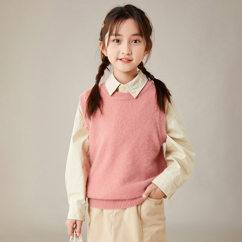 Children's knitted vest with a round collar