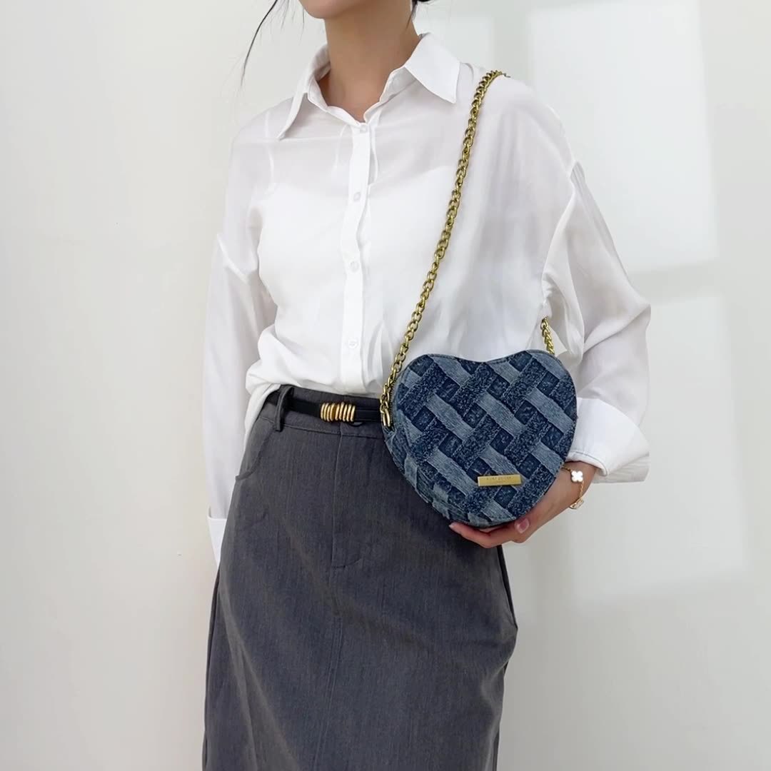 Cross-border 2024 nueva bolsa de hombro de tejido denim corazón de桃er universal bolso de mujer cadena de moda de alta calidad bolso de mochila