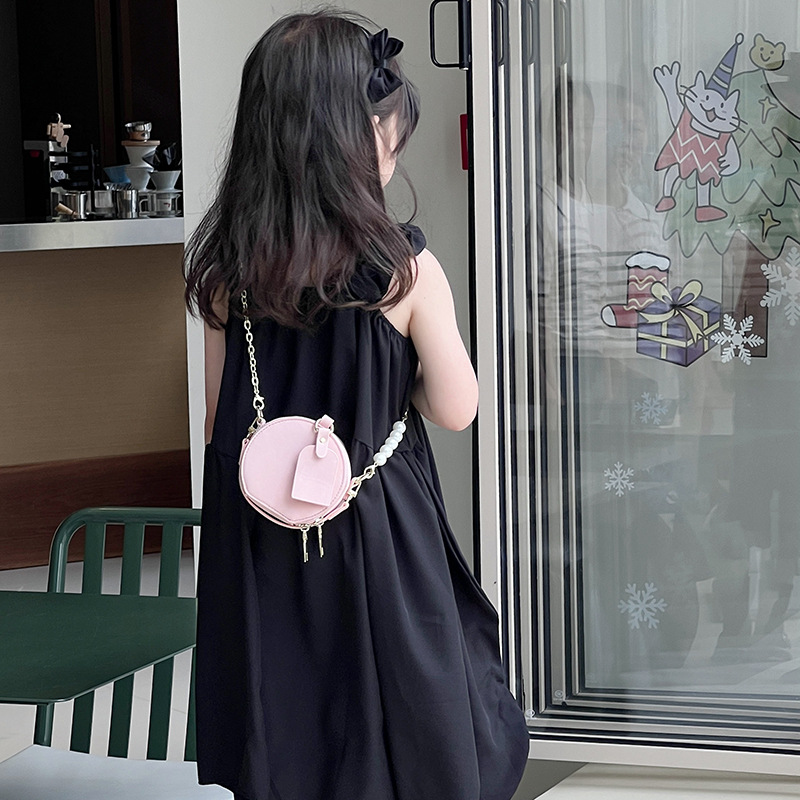 Bolsa de hombro coreana para niños y niñas de color sólido de perlas extranjeras mini bolso para bebés 2025 nueva cadena bolso para niños