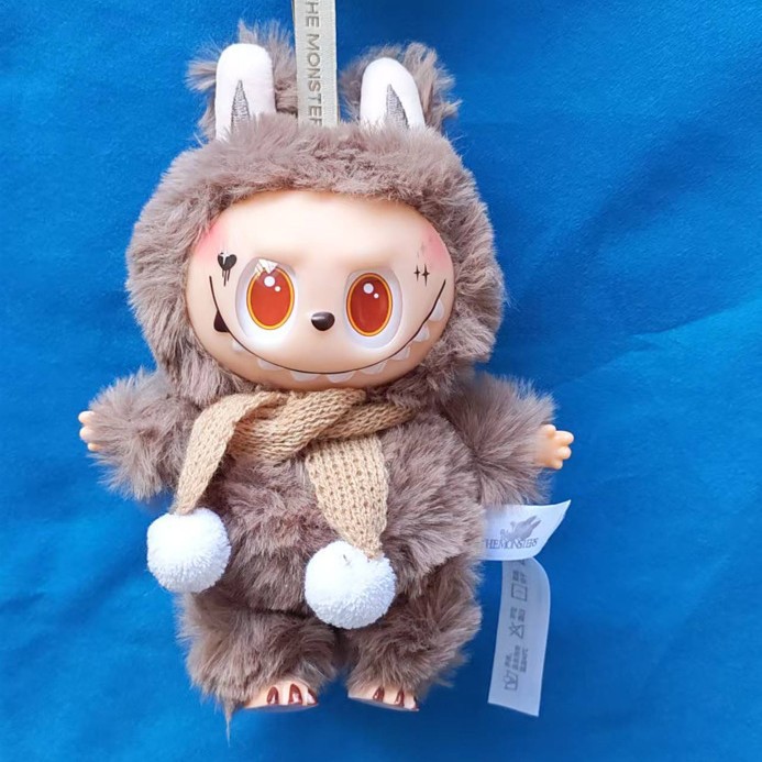 Tercera generación de tela de tela mochila de peluche muñeca colgante pellizco Le caja ciega bolsas ciegas juguetes de moda para niños