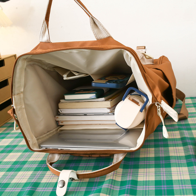 Handheld backpack for mother and baby