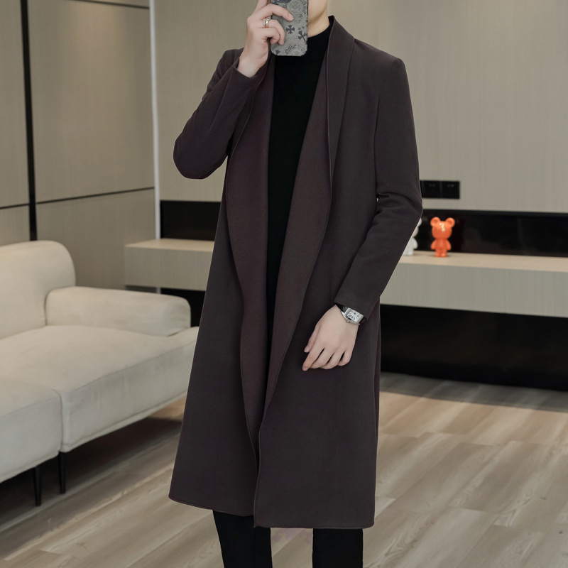 非主流のトレンチコートの男性の新型男性の長い版は膝のカーディガンのコートの中で青年のファッションの長い弾力のコートを過ぎます。