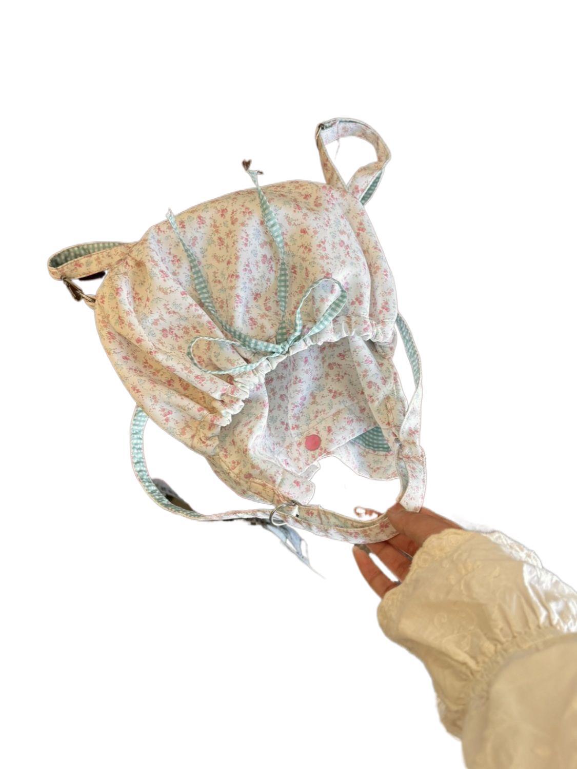 Mochila com laço floral rosa, especialmente projetada para mulheres, outono/inverno 2025, novo estilo coreano, bolsa de ombro plissada de grande capacidade para deslocamento._voghion.com