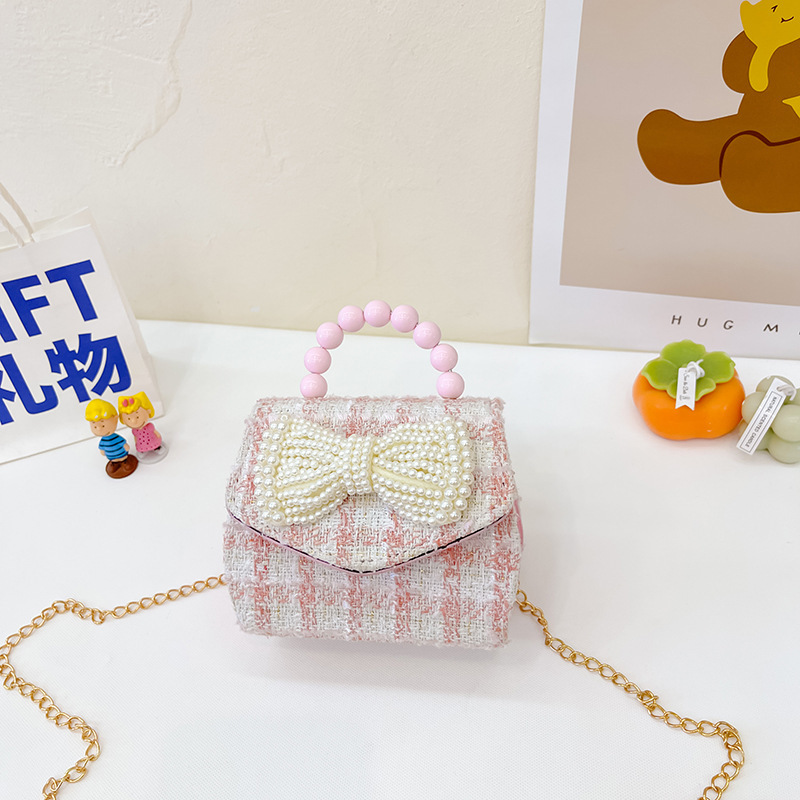 2022 nuevo arco de la celebridad en línea tejida bolso de los niños de las mujeres de estilo coreano lindo crossbody mini bolso de la perla